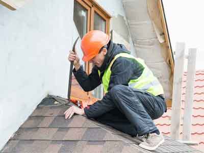 roof repair specialists working on residential roof in Folsom CA
